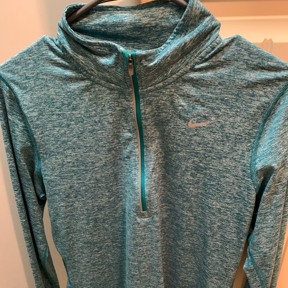 Women’s Nike green pullover. Partial zip. Nonsmoking home. Excellent shape.